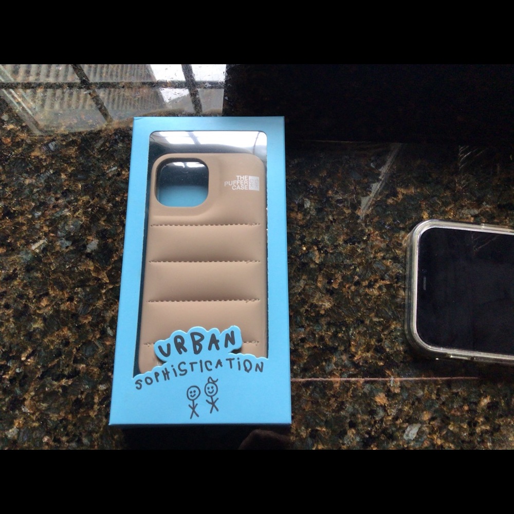 Urban Sophistication iPhone mini case. NEver used. In box.